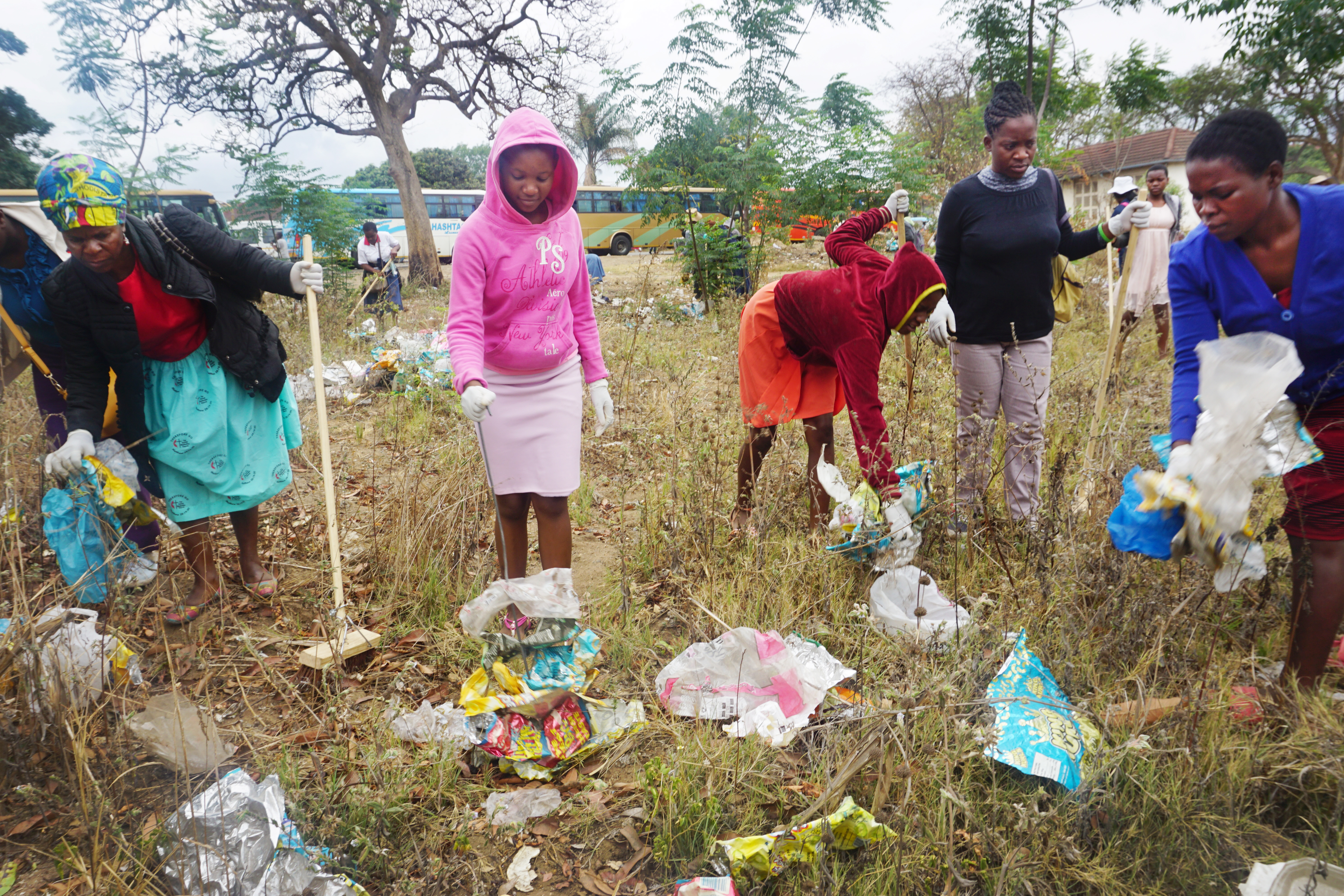 United Methodists help pick up trash at a bus depot in Mutare, Zimbabwe. The clean-up efforts followed eco-congregation training sponsored by The United Methodist Church in Zimbabwe as part of an ecumenical program designed to help churches link environmental issues and Christian faith. Photo by Kudzai Chingwe, UMNS. 