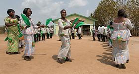 Children listen to a vocabulary lesson at the Bethlehem Day Care Center in Youhoulil, Côte d'Ivoire. The United Methodist Women’s organization in the Dabou District started the program in 2016 to help provide nutrition and education for the children of local farmers. Photo by Mike DuBose, UMNS.