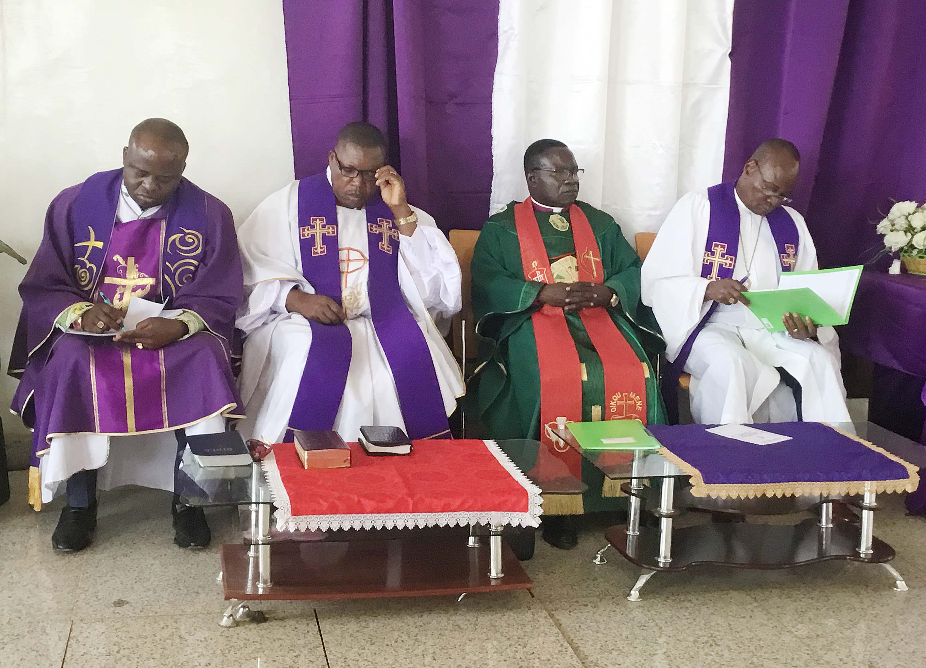 From left, Bishops Mande Muyombo, Daniel Lunge, Kasap Owan and Gabriel Yemba Unda attend the opening church service at a special meeting of the Congo Central Conference Dec. 11 in Kolwezi, Congo. Photo by Pierre T. Omadjela.