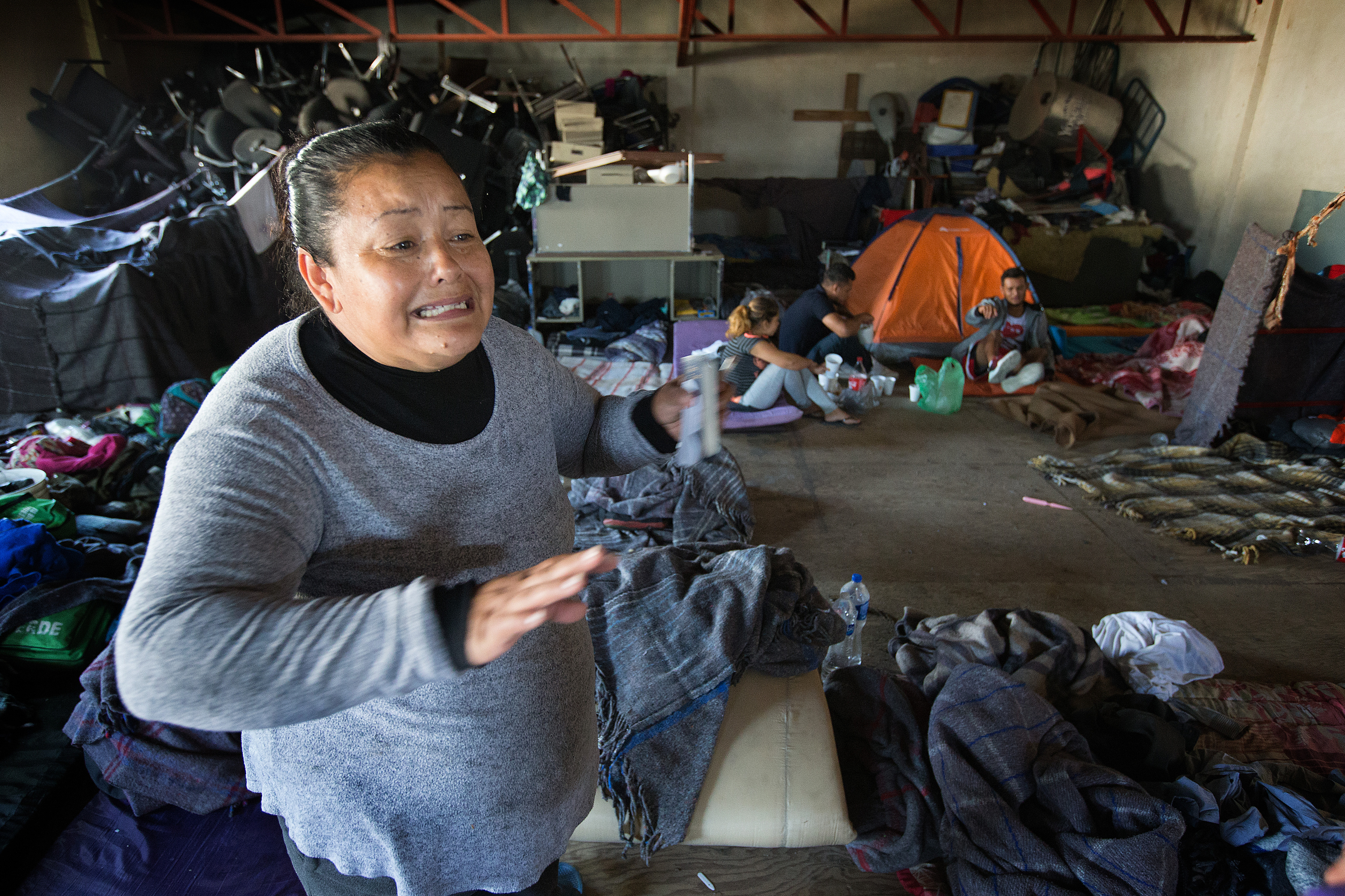 Shelter director Araceli Aviles Lopez cries as she recalls praying for a way to feed the 500 mostly Central American migrants living at Hosanna Refugio Para Mujeres, in Mexicali, Mexico. She thanked God and the people of El Divino Redentor and La Santísima Trinidad Methodist Churches for providing a meal when she could not.