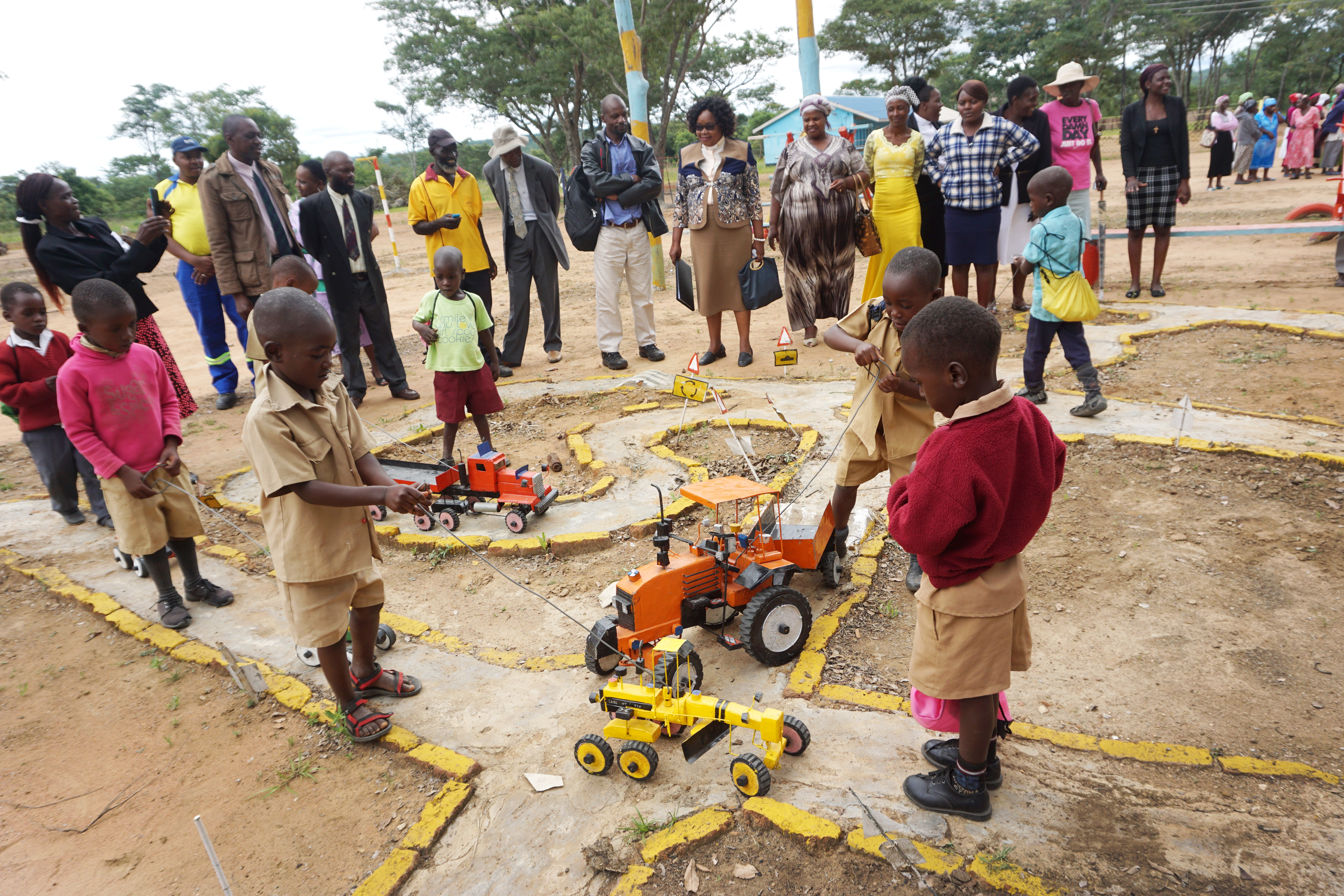Children maneuver trucks on one of the new play areas at Hanwa Mission School in Macheke, Zimbabwe. The playground and a state-of-the-art early childhood development center were built through a partnership between the Zimbabwe Episcopal Area and Volunteers in Mission from the Baltimore-Washington Conference. Photo by Kudzai Chingwe, UMNS.