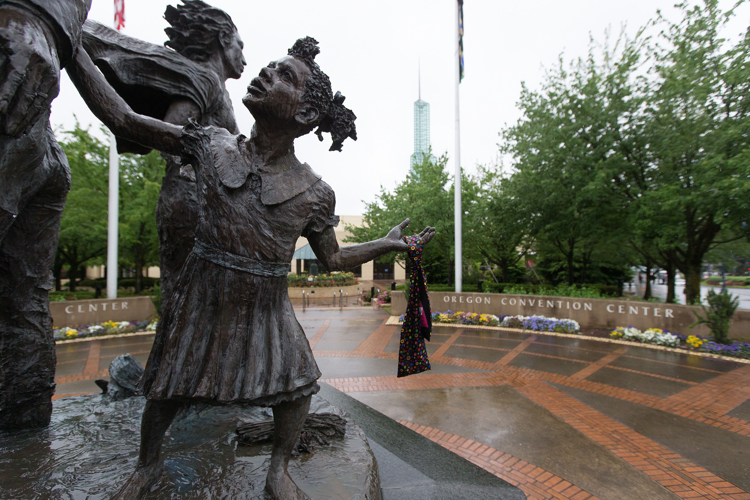 A rainbow stole, symbol of supporters for LGBTQ equality in The United Methodist Church, hangs from an arm of The Dream, a sculpture just outside the site of the 2016 General Conference in Portland, Ore. Just ahead of General Conference 2019, which will address the church’s homosexuality debate, LGBTQ clergy released an open letter to LGBTQ laity. File photo by Mike DuBose, UMNS.