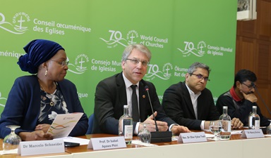 Staff at the World Council of Churches speak during a public launch in Geneva for a new downloadable resource to help churches take practical steps to care for the earth. The event also honored the legacy of the Rev. Norman Tendis, who died in the Ethiopian Airlines crash two days earlier. From left are Isabel Apawo Phiri, the Rev. Olav Fykse Tveit,  Dr. Manoj Kurian and Dinesh Suna. Photo by Ivars Kupcis/WCC. Staff at the World Council of Churches speak during a public launch in Geneva for a new downloadable resource to help churches take practical steps to care for the earth. The event also honored the legacy of the Rev. Norman Tendis, who died in the Ethiopian Airlines crash two days earlier. From left are Isabel Apawo Phiri, the Rev. Olav Fykse Tveit,  Dr. Manoj Kurian and Dinesh Suna. Photo by Ivars Kupcis/WCC.