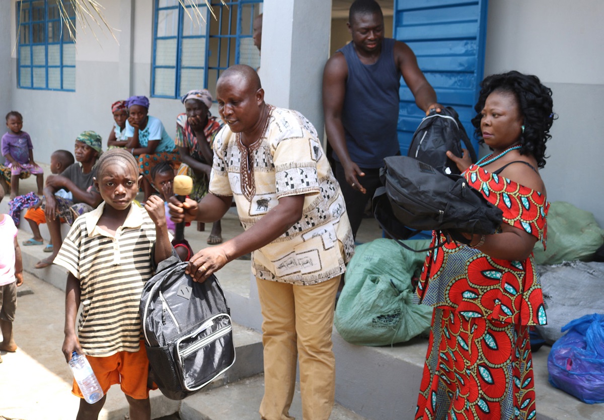 A new student at The United Methodist Church Primary School in Sayllu, Sierra Leone, receives a backpack, uniform, shoes, books and other learning materials in preparation for the start of the 2019 school year. Photo by Phileas Jusu, UMNS.  A new student at The United Methodist Church Primary School in Sayllu, Sierra Leone, receives a backpack, uniform, shoes, books and other learning materials in preparation for the start of the 2019 school year. Photo by Phileas Jusu, UMNS.