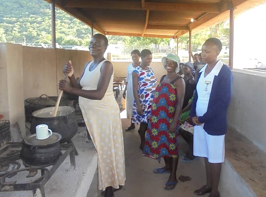Mothers-to-be cook together in an open-air kitchen at the new mothers’ shelter in Mutare, Zimbabwe. The shelter for high-risk mothers was completed with a grant from the United Methodist Board of Global Ministries. Photo by Kudzai Chingwe, UMNS. Mothers-to-be cook together in an open-air kitchen at the new mothers’ shelter in Mutare, Zimbabwe. The shelter for high-risk mothers was completed with a grant from the United Methodist Board of Global Ministries. Photo by Kudzai Chingwe, UMNS.