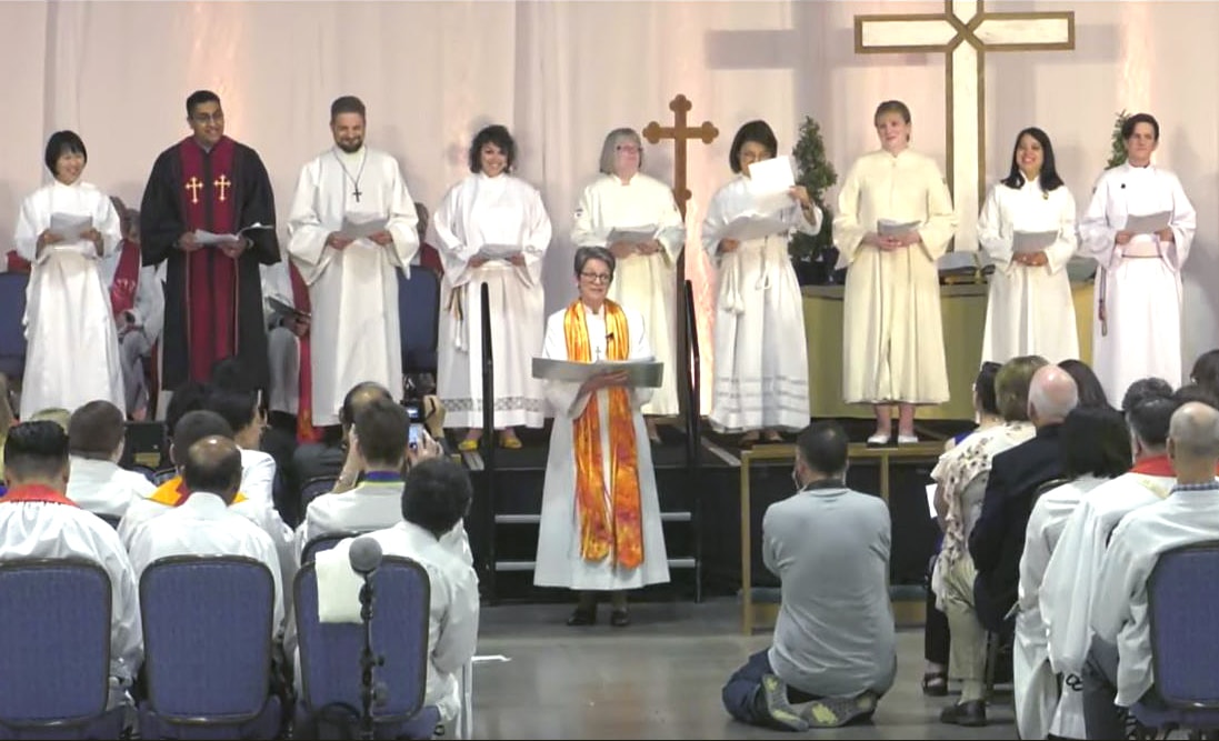 A Northern Illinois Conference ordination and commissioning service took place June 2 at the Renaissance Schaumburg Convention Center in Schaumburg, Ill. The conference ordained two deacons and seven elders, including an openly transgender deacon. Four were commissioned as provisional deacons, including two openly LGBTQ candidates. Two candidates were commissioned as provisional elders. Video image courtesy of Northern Illinois Conference livestream.