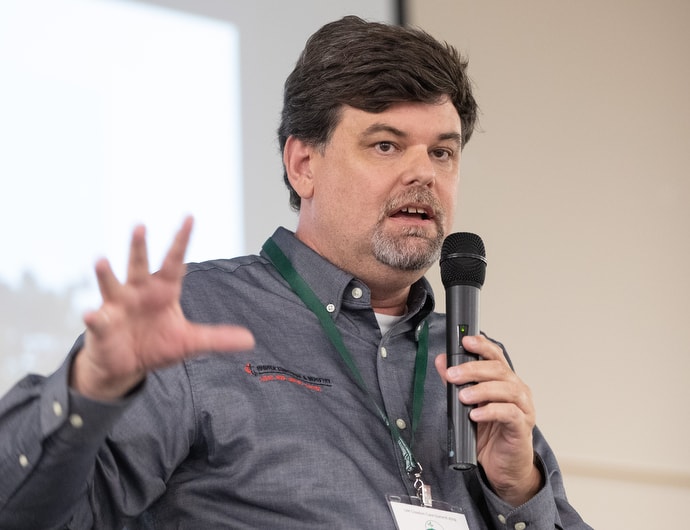 The Rev. Mark Y. A. Davies says we have about 11 years to address climate change before it is too late. Davies, director of the World House Institute for Social and Ecological Responsibility at Oklahoma City University, helped lead an international panel discussion during the summit. Photo by Mike DuBose, UM News.
