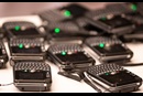 Spare voting machines rest on a table at the 2019 United Methodist General Conference in St. Louis. Photo by Mike DuBose, UM News.