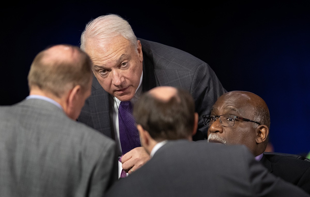 Bishops Thomas J. Bickerton (center) and Gregory V. Palmer (right) confer with colleagues on legislative procedures during the 2019 United Methodist General Conference in St. Louis. Bickerton is the Council of Bishops representative on the Commission on General Conference. The Commission on General Conference — meeting behind closed doors — reviewed an investigation that found evidence of four ineligible people casting votes using the credentials of delegates who were not present. File photo by Mike DuBose, UM News. Bishops Thomas J. Bickerton (center) and Gregory V. Palmer (right) confer with colleagues on legislative procedures during the 2019 United Methodist General Conference in St. Louis. Bickerton is the Council of Bishops representative on the Commission on General Conference. The Commission on General Conference — meeting behind closed doors — reviewed an investigation that found evidence of four ineligible people casting votes using the credentials of delegates who were not present. File photo by Mike DuBose, UM News.