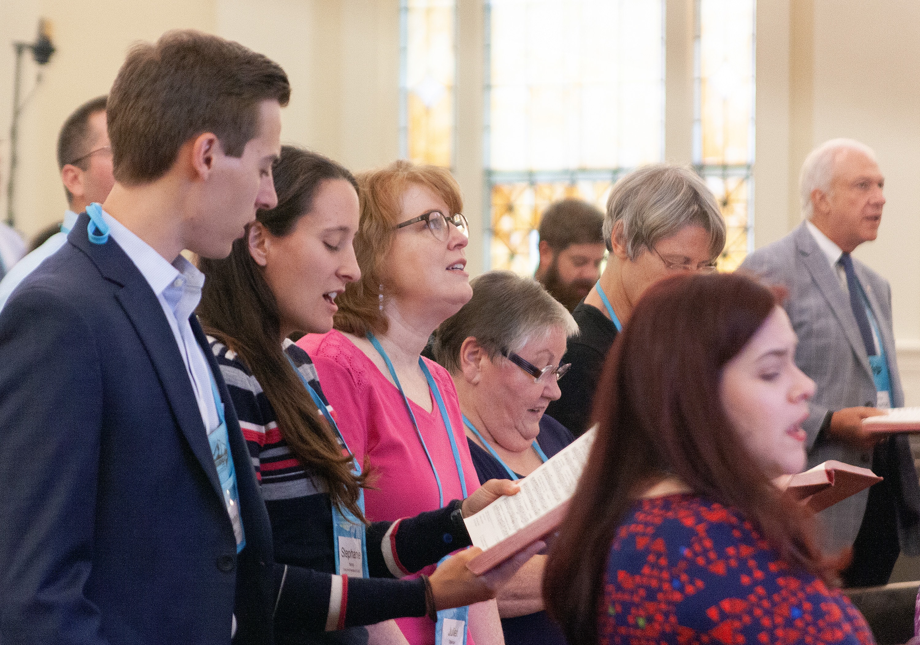 Commission on General Conference members and staff sing “Great is Thy Faithfulness” during opening worship at their meeting at First United Methodist Church in Lexington, Ky. The group decided to use a well-known Bible verse as the 2020 General Conference theme. Photo by Heather Hahn, UM News.
