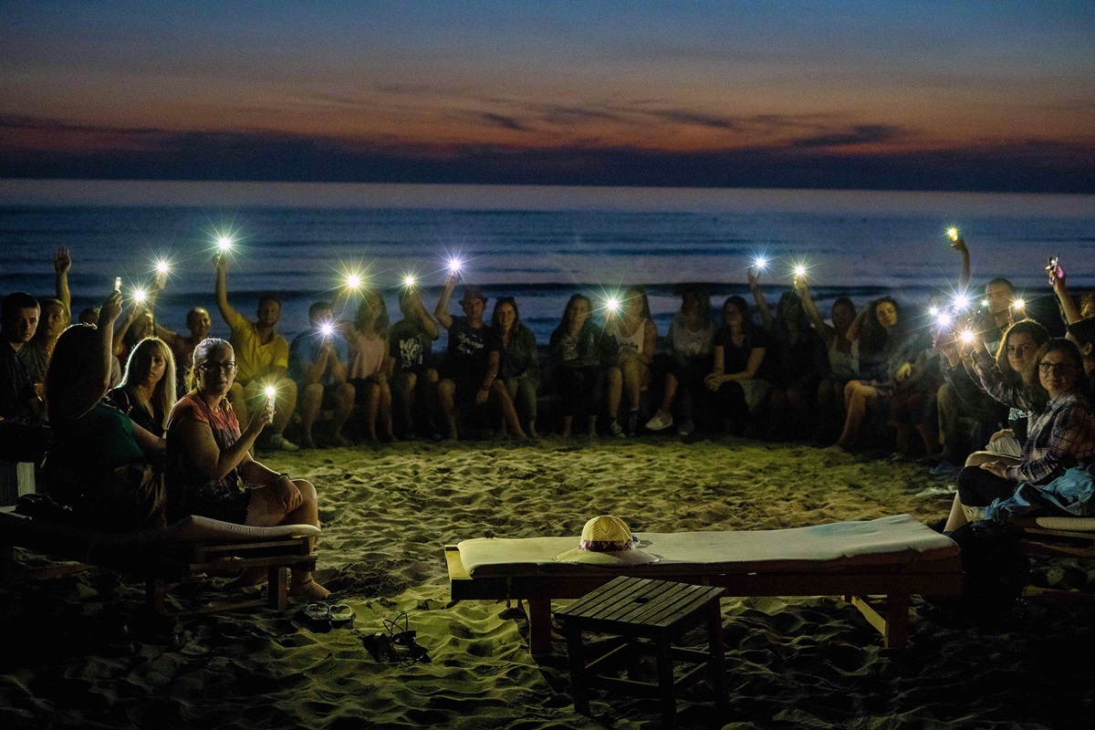 About 30 young people from Albania, Macedonia and Serbia gathered for the second United Methodist Regional Youth Camp in the coastal area of Spille, Albania. A sunset visit to the beach turned into an impromptu worship service for as those in attendance gathered in a circle and “praised the Lord.” Photo by Danail Ristovski, Skopje/Macedonia. About 30 young people from Albania, Macedonia and Serbia gathered for the second United Methodist Regional Youth Camp in the coastal area of Spille, Albania. A sunset visit to the beach turned into an impromptu worship service for as those in attendance gathered in a circle and “praised the Lord.” Photo by Danail Ristovski, Skopje/Macedonia.