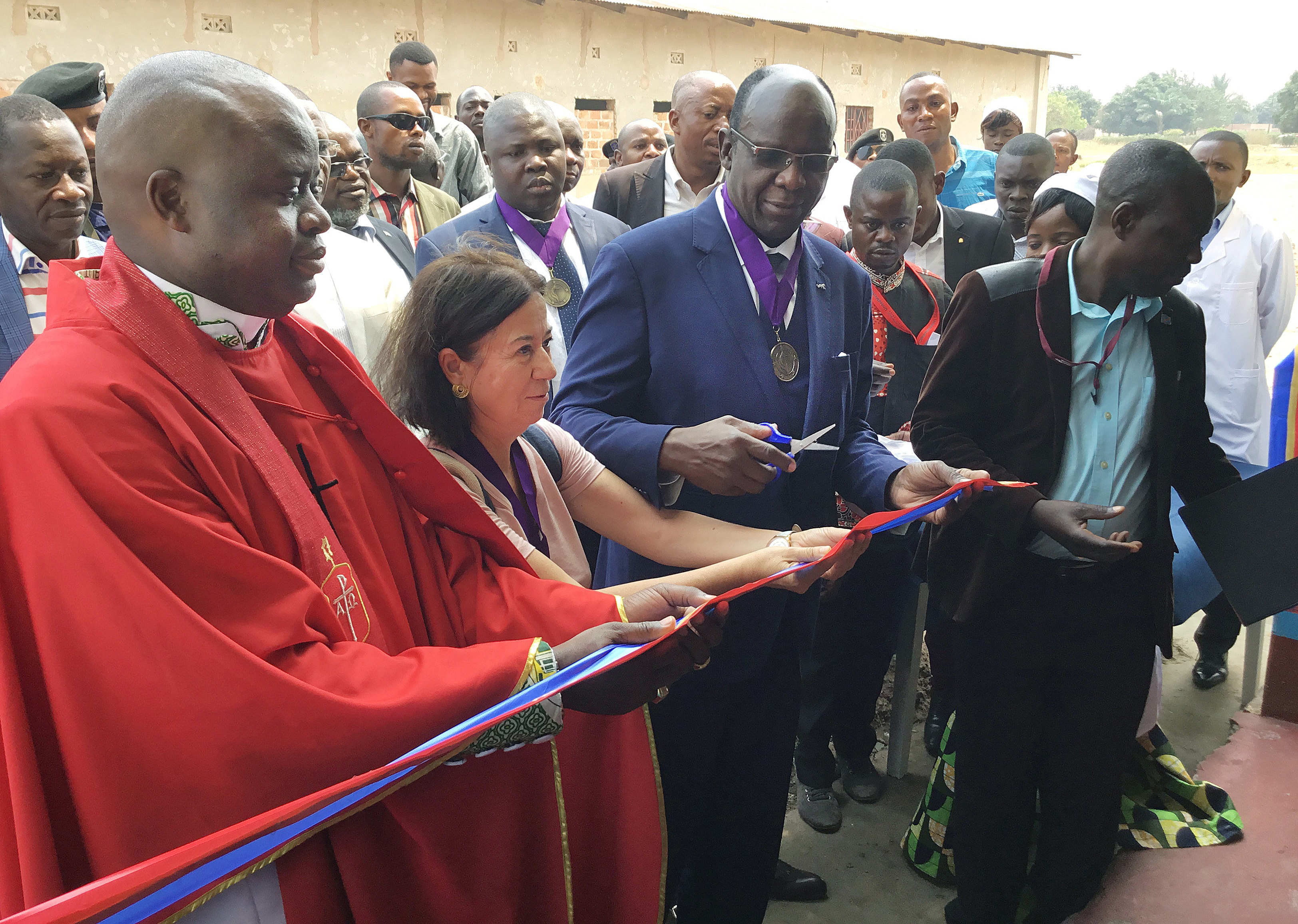 United Methodist Bishop Mande Muyombo, left, Dr. Graciela Salvador Davila, director of Global Health for the United Methodist Board of Global Ministries, and Haut-Lomami Governor Marcel Lenge Masangu Mpoyo celebrate renovations and upgrades at United Methodist Lupandilo Hospital and Shungu Clinic in Kamina, Congo. Photo by Betty Kazadi Musau, UM News. 