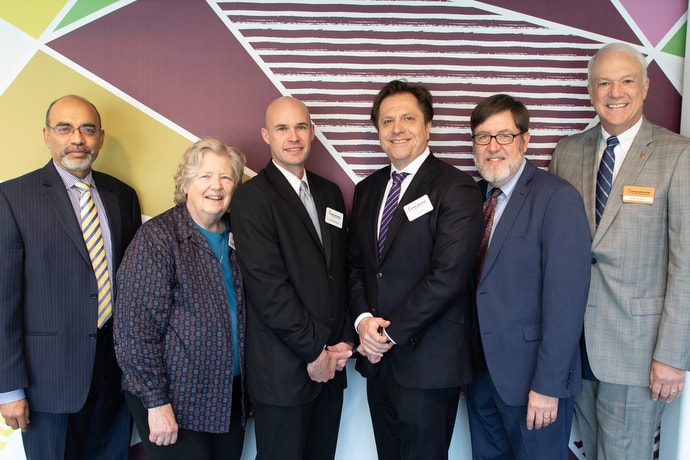 Those supporting the initiation of the asylum seekers project are, from left, Roland Fernandes, United Methodist Committee on Relief; Mary Fitz-Simmons and Rob Rutland-Brown, National Justice for Our Neighbors;  Erol Kekic, Church World Service; and the Rev. Jack Amick and Bishop Thomas J. Bickerton, UMCOR. Photo by Anthony Trueheart, Global Ministries. 