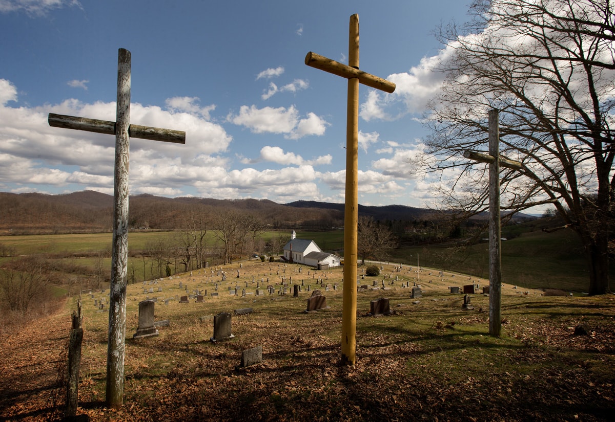 Three crosses stand above the cemetery at Israel United Methodist Church near Montrose, W.Va. Photo by Mike DuBose, UM News.