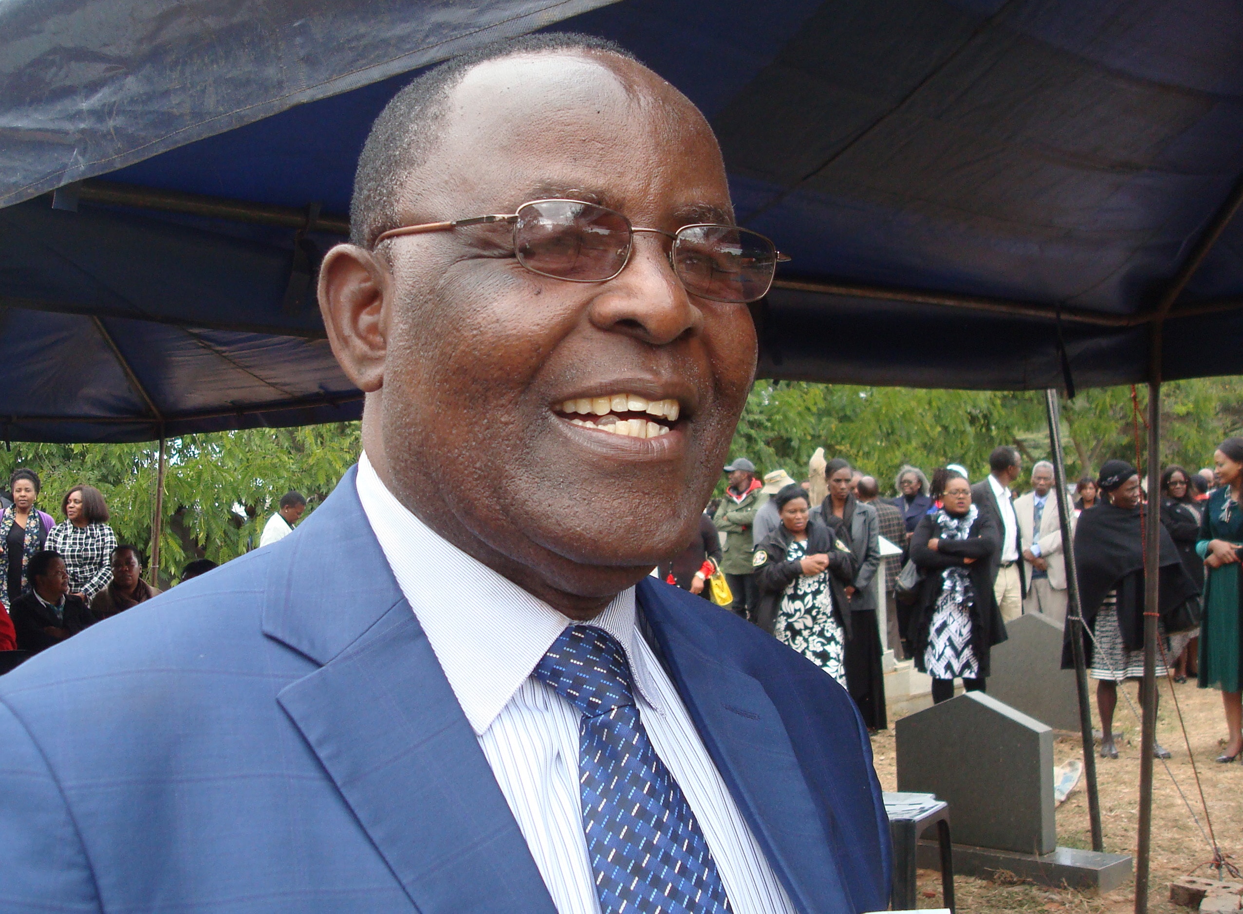 In his role as a funeral chaplain in Zimbabwe, United Methodist Elison Kamupira uses his faith to comfort the grieving. He serves with a unique combination of compassion and humor. Photo by Kudzai Chingwe, UM News.