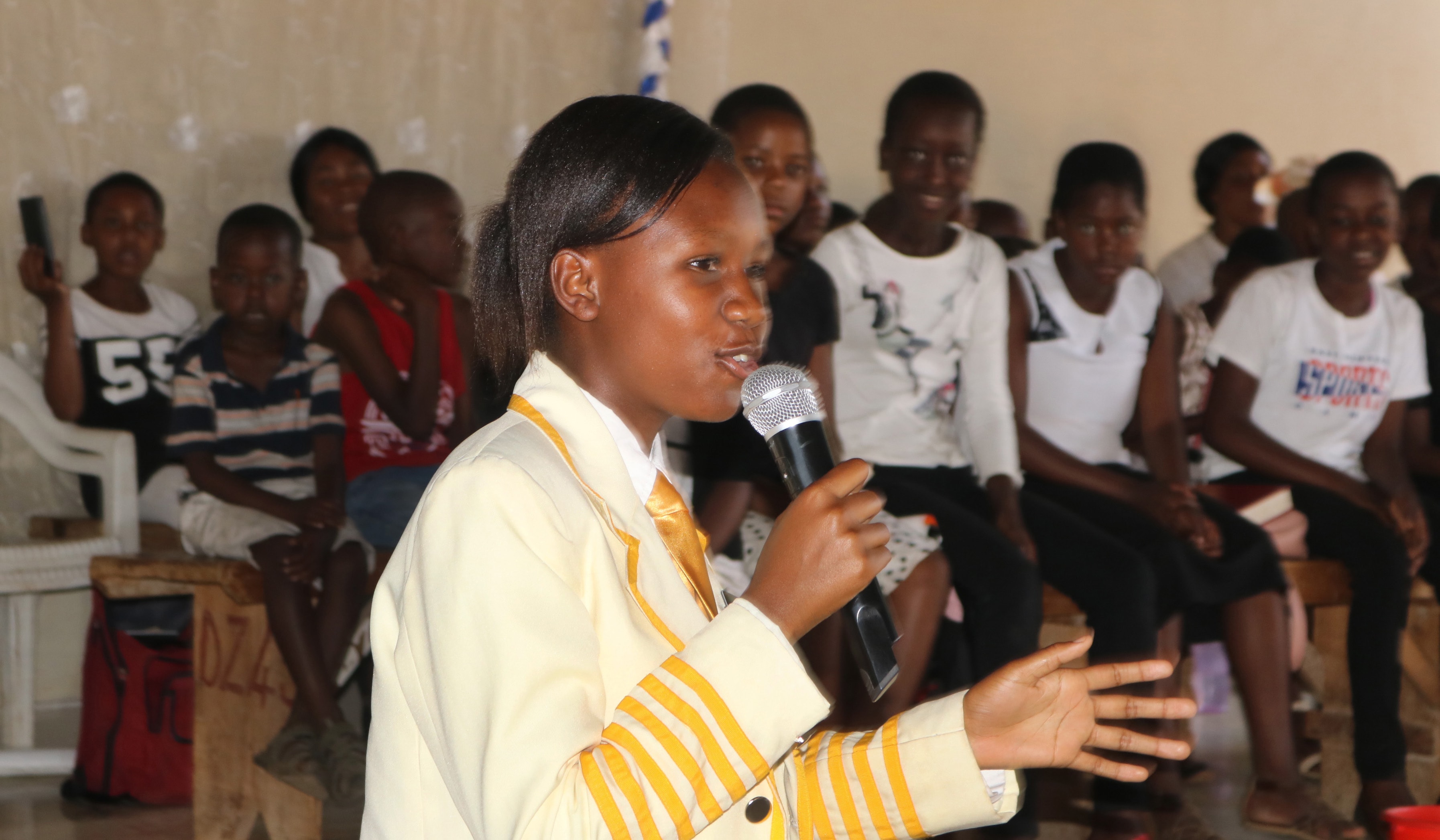 Teenager Melody Rudairo Nyamadzi, a junior Parliament representative and a member of the United Methodist Youth Fellowship, urges children to let their voices be heard during a special service led by the children’s ministry at St. Dorcas United Methodist Church in Harare, Zimbabwe. Photo by the Rev. Taurai Emmanuel Maforo, UM News.