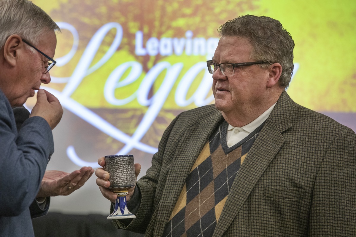 Per-Endre Bjørnevik (left), a General Council on Finance and Administration board member from Norway, receives communion from the Rev. Steve Wood, board member from the North Georgia Conference. During the board meeting Nov. 14-15 in Nashville, Tenn., the GCFA board responded to a letter from European bishops objecting to cuts to office expenses. Photo by Kathleen Barry, UM News.  Per-Endre Bjørnevik (left), a General Council on Finance and Administration board member from Norway, receives communion from the Rev. Steve Wood, board member from the North Georgia Conference. During the board meeting Nov. 14-15 in Nashville, Tenn., the GCFA board responded to a letter from European bishops objecting to cuts to office expenses. Photo by Kathleen Barry, UM News.
