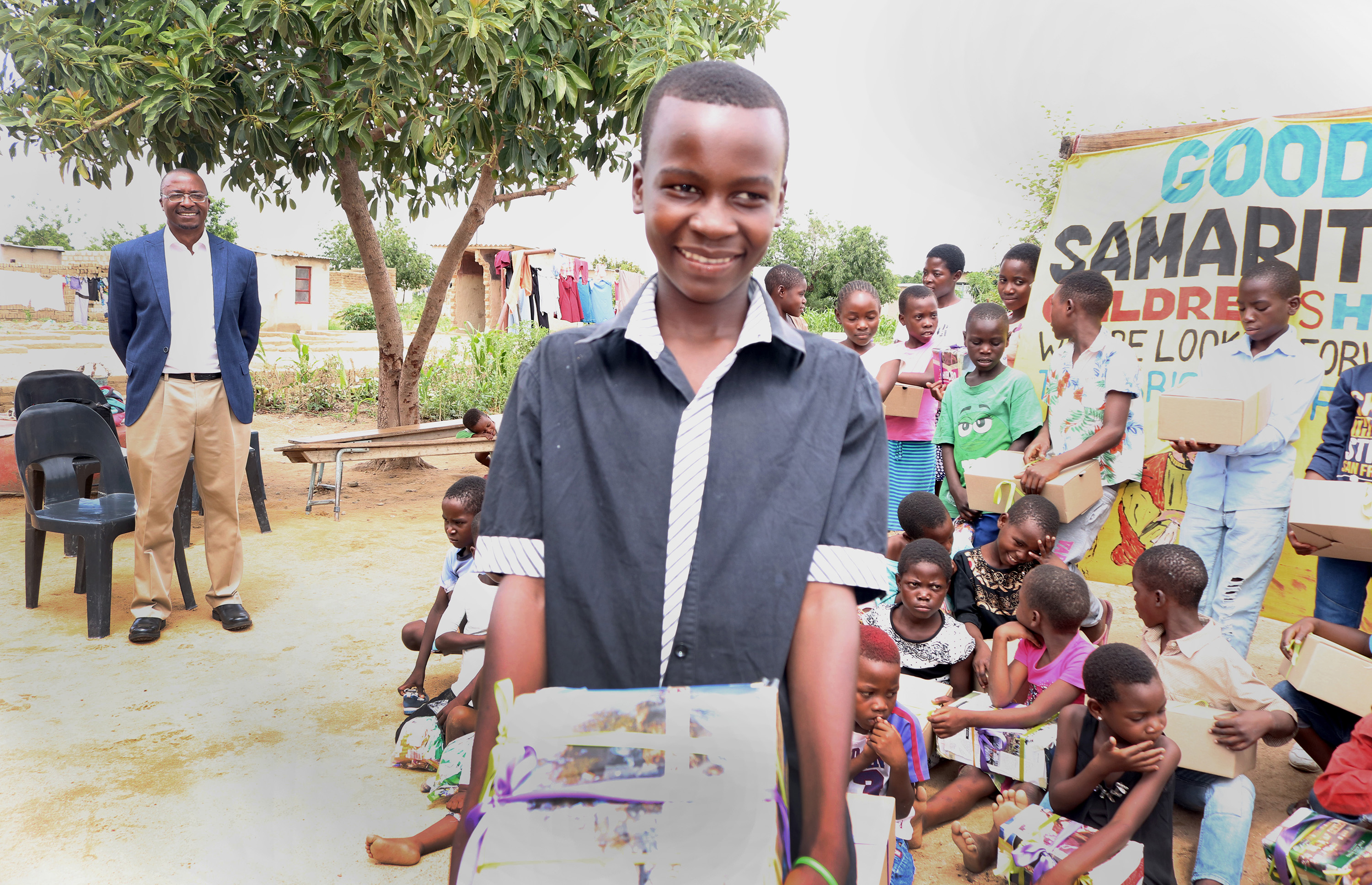 Obert Chikwato shows off a gift he received from members of The United Methodist Church in Zimbabwe on Dec. 13. “This is my first time to get a Christmas gift,” said the 16-year-old, who lives at Good Samaritan Children’s Home, a foster home in Harare, Zimbabwe. Photo by Priscilla Muzerengwa, UM News. 