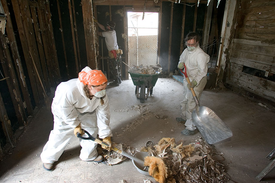 Virginia Tech students Lisa Rubin (left) and Rachel St. John help gut the interior of Ernest Franklin’s home in New Orleans during their spring vacation in 2006. The group was one of several working through the Louisiana United Methodist Storm Recovery Center after Hurricane Katrina. File photo by Mike DuBose, UMNS.