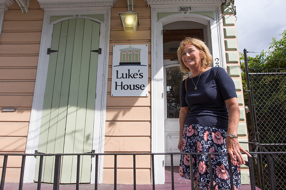 The Rev. Carol Winn Crawford stands on the front stoop of Luke's House, a free medical clinic that was founded in the aftermath of Hurricane Katrina. Crawford, who has been involved with the clinic since its inception, is senior pastor of Rayne Memorial United Methodist Church in New Orleans. Photo by Mike DuBose, UMNS.