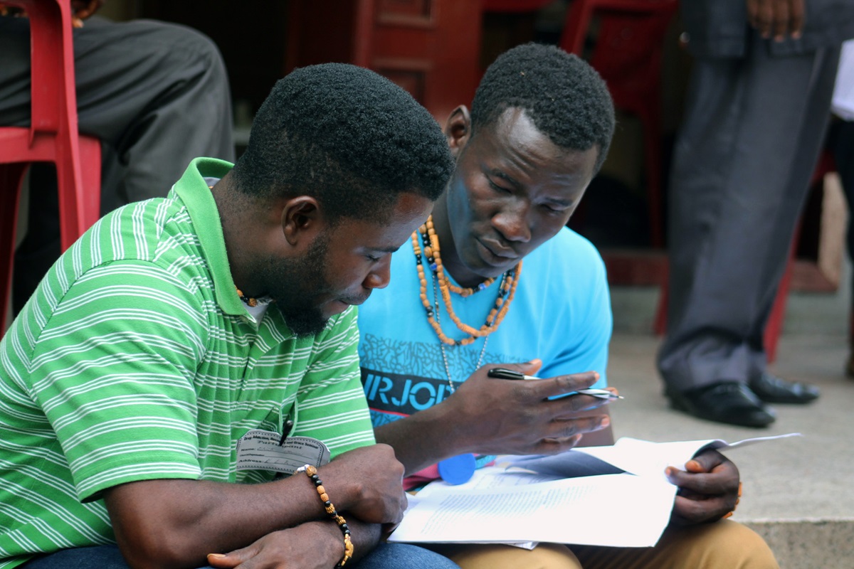 Eric Nyenow (left) and Emmanuel Gbuie, residents of the United Methodist New Life Recovery Center, review their notes during an addiction and substance abuse seminar in Monrovia, Liberia. The United Methodist Church in Liberia hosted the seminar to help local churches expand and strengthen their recovery ministries. Photo by E Julu Swen, UM News. Eric Nyenow (left) and Emmanuel Gbuie, residents of the United Methodist New Life Recovery Center, review their notes during an addiction and substance abuse seminar in Monrovia, Liberia. The United Methodist Church in Liberia hosted the seminar to help local churches expand and strengthen their recovery ministries. Photo by E Julu Swen, UM News.