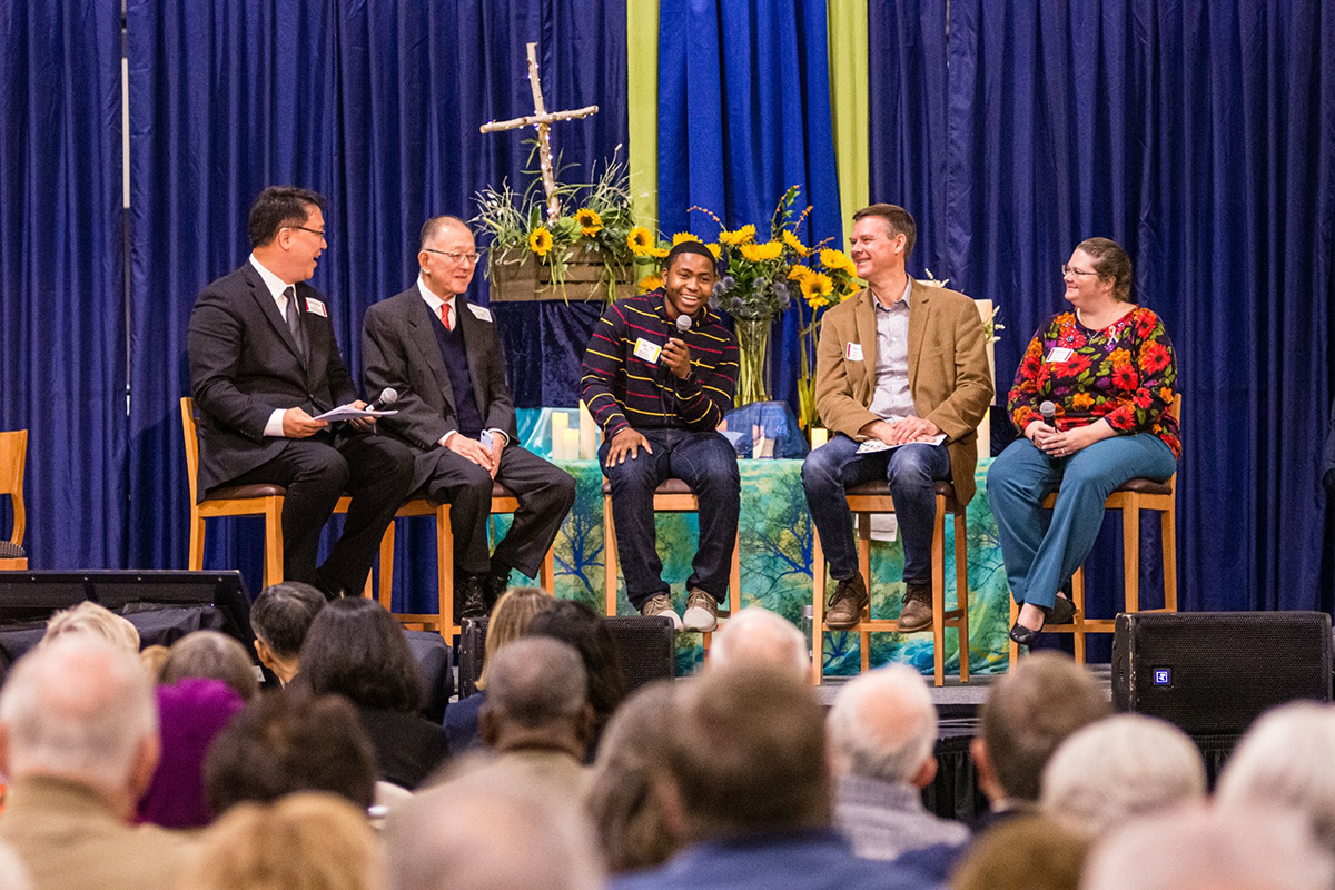Zach Holder (center), with members of the Way Forward team, speaks during a special session of the Greater New Jersey Annual Conference in October 2019. The United Methodist Judicial Council will review five rulings of law related to that session, which resulted in an overwhelming vote to let churches decide how to include and affirm LGBTQ people while still giving congregations the right to agree to disagree. Photo by Corbin Payne. Zach Holder (center), with members of the Way Forward team, speaks during a special session of the Greater New Jersey Annual Conference in October 2019. The United Methodist Judicial Council will review five rulings of law related to that session, which resulted in an overwhelming vote to let churches decide how to include and affirm LGBTQ people while still giving congregations the right to agree to disagree. Photo by Corbin Payne.