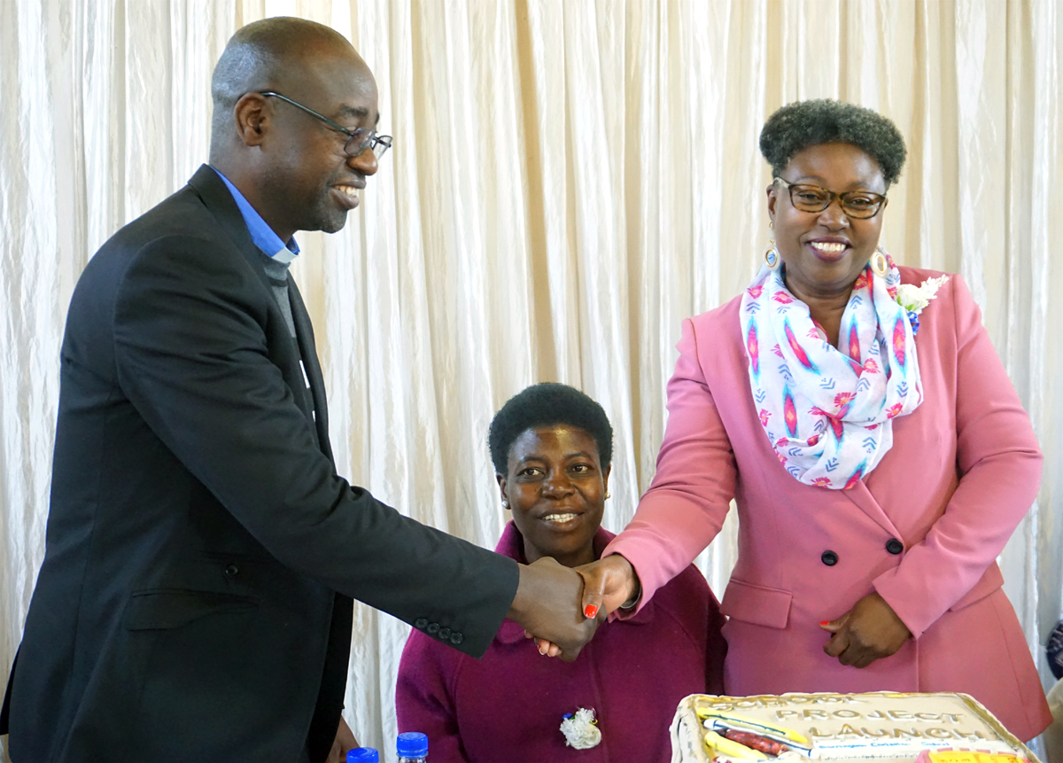 The Rev. Henry Luckson Chareka (left) congratulates guest of honor Mwazvita Patricia Katsidzira-Madondo, during the launch of United Methodist Barrington Christian School in Harare, Zimbabwe. Joyce Chikuni (center), board chairperson of the school, watches. The school will be the first private United Methodist institution in the urban part of Harare and the first to be run by United Methodist women. Photo by Kudzai Chingwe, UM News. The Rev. Henry Luckson Chareka (left) congratulates guest of honor Mwazvita Patricia Katsidzira-Madondo, during the launch of United Methodist Barrington Christian School in Harare, Zimbabwe. Joyce Chikuni (center), board chairperson of the school, watches. The school will be the first private United Methodist institution in the urban part of Harare and the first to be run by United Methodist women. Photo by Kudzai Chingwe, UM News.