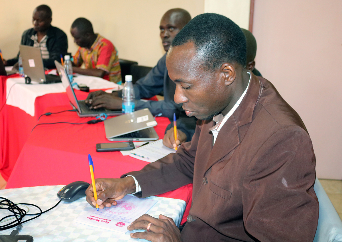 The Rev. Danson Maganga from Tanzania takes notes during a United Methodist e-Academy weeklong training session in Nairobi, Kenya. The goal of the new e-learning program is to equip people for ordained and lay leadership in rural communities. Photo by Gad Maiga, UM News. The Rev. Danson Maganga from Tanzania takes notes during a United Methodist e-Academy weeklong training session in Nairobi, Kenya. The goal of the new e-learning program is to equip people for ordained and lay leadership in rural communities. Photo by Gad Maiga, UM News.