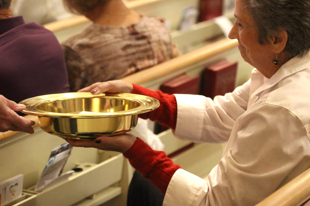A woman holds an offering plate during a service at Boise United Methodist Church in Boise, Idaho. United Methodist collection rates in 2019 dipped below recent years, but the drop wasn’t as steep as initially projected. Photo courtesy of the Marketing Department, United Methodist Communications. A woman holds an offering plate during a service at Boise United Methodist Church in Boise, Idaho. United Methodist collection rates in 2019 dipped below recent years, but the drop wasn’t as steep as initially projected. Photo courtesy of the Marketing Department, United Methodist Communications.