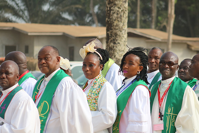 Clergy members of the Liberia Annual Conference process to the closing service of the meeting in Ganta. The conference passed a resolution that includes this statement: “We resolve that all central conferences be treated as equal members of our global connection and left to decide of their own volition their future association and destiny.” Photo by E Julu Swen, UM News.