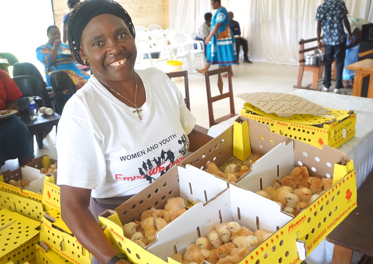 Tendai Rebecca Gurupira, area coordinator for The United Methodist Church’s Ministry of Women, Youth and Children, holds a box with 100 chicks to be given out to women and girls in the drought-prone Masvingo District in Zimbabwe. The farming project is funded by an $8,000 grant from United Methodist Women. Photo by Kudzai Chingwe, UM News. Tendai Rebecca Gurupira, area coordinator for The United Methodist Church’s Ministry of Women, Youth and Children, holds a box with 100 chicks to be given out to women and girls in the drought-prone Masvingo District in Zimbabwe. The farming project is funded by an $8,000 grant from United Methodist Women. Photo by Kudzai Chingwe, UM News.