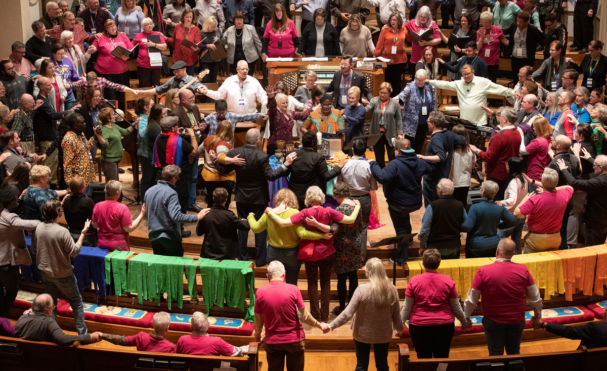 Attendees and guests of the Reconciling Ministries Network convocation pray together at the altar at Belmont United Methodist Church in Nashville, Tenn. LGBTQ United Methodists and their allies expressed hope that a proposal to separate the denomination might pave the way to end what they see as discrimination. Photo by Mike DuBose, UM News. Attendees and guests of the Reconciling Ministries Network convocation pray together at the altar at Belmont United Methodist Church in Nashville, Tenn. LGBTQ United Methodists and their allies expressed hope that a proposal to separate the denomination might pave the way to end what they see as discrimination. Photo by Mike DuBose, UM News.