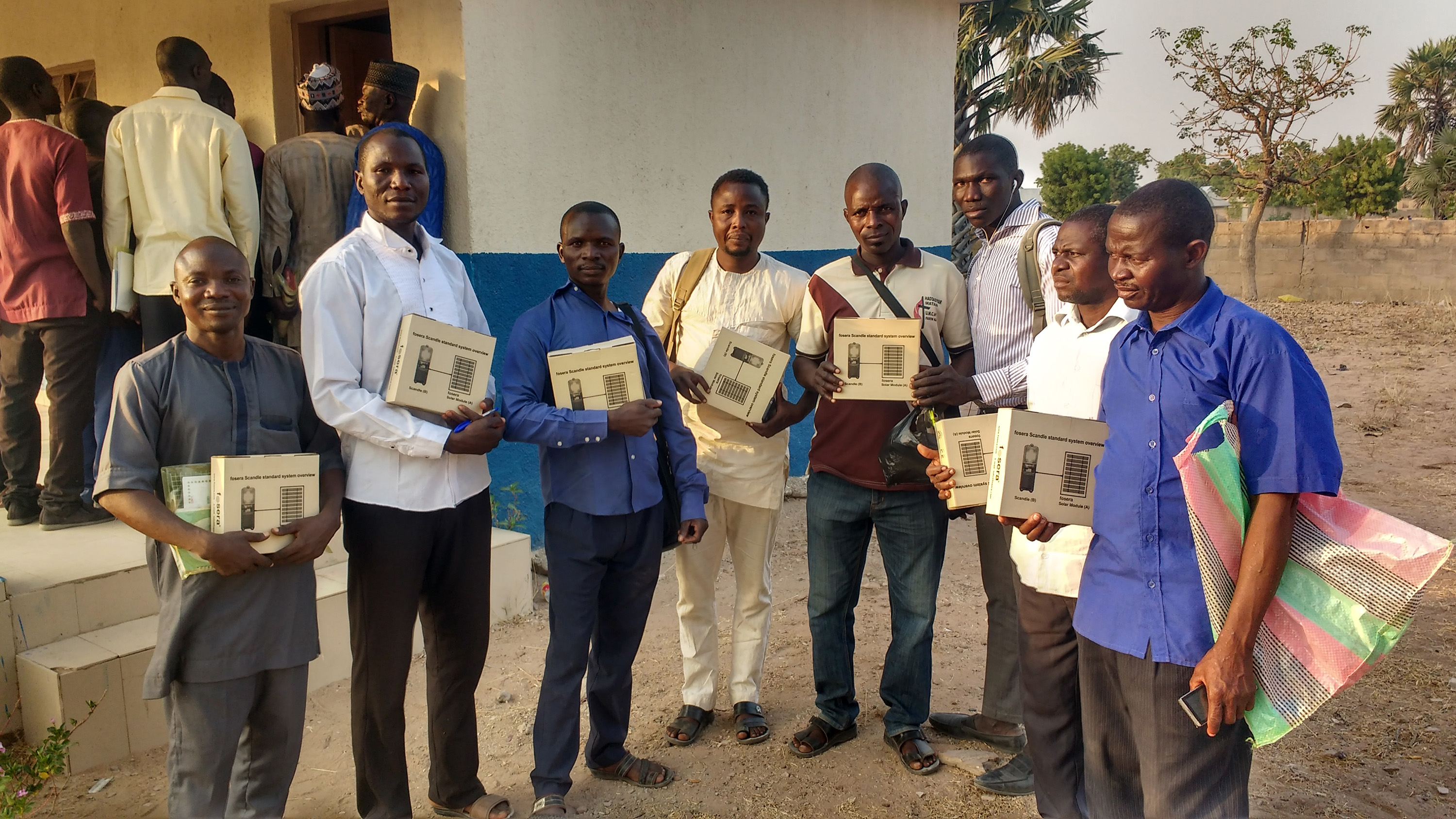 Clergy and lay leaders from the Northern Nigeria Conference hold portable torches outside the conference office in Gombe State, Nigeria. “Almost 90% of the Nigeria population is facing power challenges, and these solar lanterns will help clergy in terms of devotion, Bible studies and other church activities,” said Nigeria Area Bishop John Wesley Yohanna. Photo by Daniel Garba, UM News.