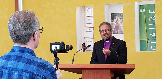 A camera is set to record the 2020 Good Friday online service with Germany Bishop Harald Rückert. As elsewhere, United Methodist churches in Germany were closed because of the during the coronavirus pandemic. The service was recorded on Holy Thursday at the United Methodist Church of Christ Frankfurt am Main, Germany. Photo by Leonie Minor.