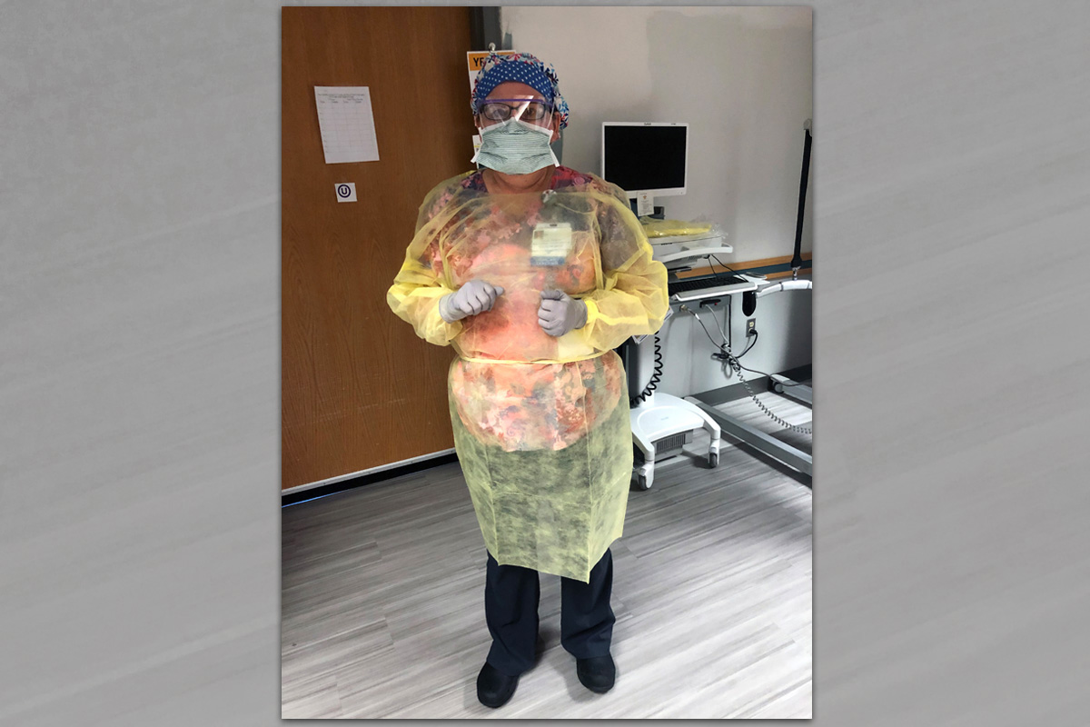 The Rev. Diane Dyson in full gear as a hospital nurse caring for COVID-19 patients. Dyson is a United Methodist deacon and says her clergy background has helped her to be a better listener as a nurse. Photo courtesy of Diane Dyson.