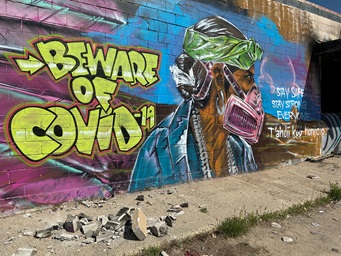 A mural warns residents of the danger posed by the COVID-19 outbreak in the Navajo Nation near Shiprock, N.M. The United Methodist Church’s Four Corners Native American Ministry is helping support tribal members and front-line workers on the reservation. Photo by Andrew Hay, REUTERS. A mural warns residents of the danger posed by the COVID-19 outbreak in the Navajo Nation near Shiprock, N.M. The United Methodist Church’s Four Corners Native American Ministry is helping support tribal members and front-line workers on the reservation. Photo by Andrew Hay, REUTERS.