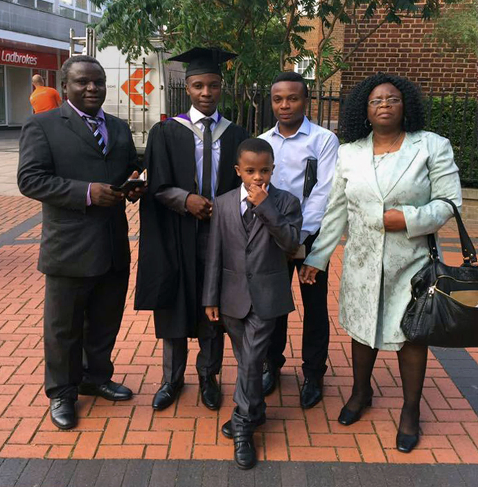 Alice Sarupinda (right) stands with her family for a graduation portrait. Sarupinda,  a Zimbabwean and a United Methodist who lived in England,  contracted the coronavirus while working at a nursing home in Walsall, England. She died April 17, at age 53. Photo courtesy of the Sarupinda family.