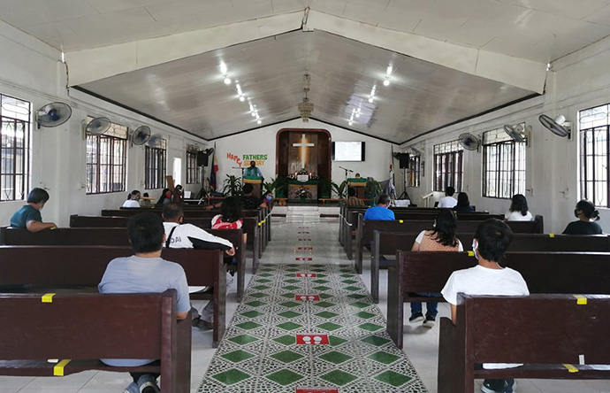 Polomolok United Methodist Church in South Cotabato, Philippines, reopened in June in compliance with health protocols, which include mask wearing and social distancing. Photo courtesy of Sime Neri P. Ulanday.