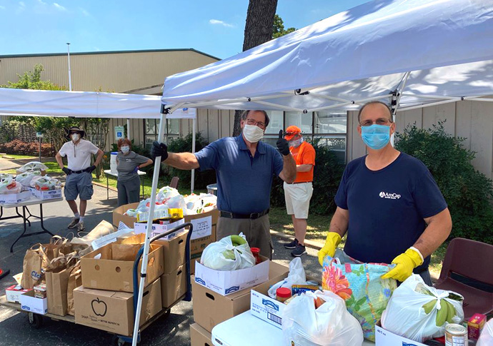 Volunteers with Chapelwood United Methodist Church’s Fair Haven Food Pantry serve their Houston neighbors in need of food during the COVID-19 pandemic. The church is among hundreds of United Methodist ministries that have been able to pay employees and continue ministry with help from a Paycheck Protection Program loan. Photo courtesy of Chapelwood United Methodist Church.