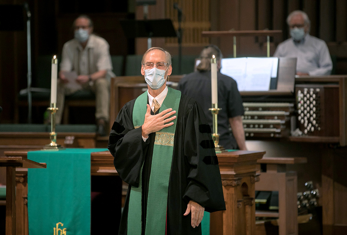 The Rev. Paul Escamilla takes to the pulpit at Lauren Heights United Methodist Church, in San Antonio, on June 14. The church reopened for in-person worship that Sunday but closed again the following Sunday and has remained closed because of high COVID-19 case numbers locally. Photo by David Smith, courtesy of Laurel Heights United Methodist Church.