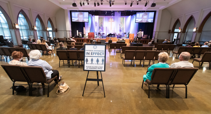 Parishioners sit apart from one another during worship at Franklin First United Methodist Church. Photo by Mike DuBose, UM News.