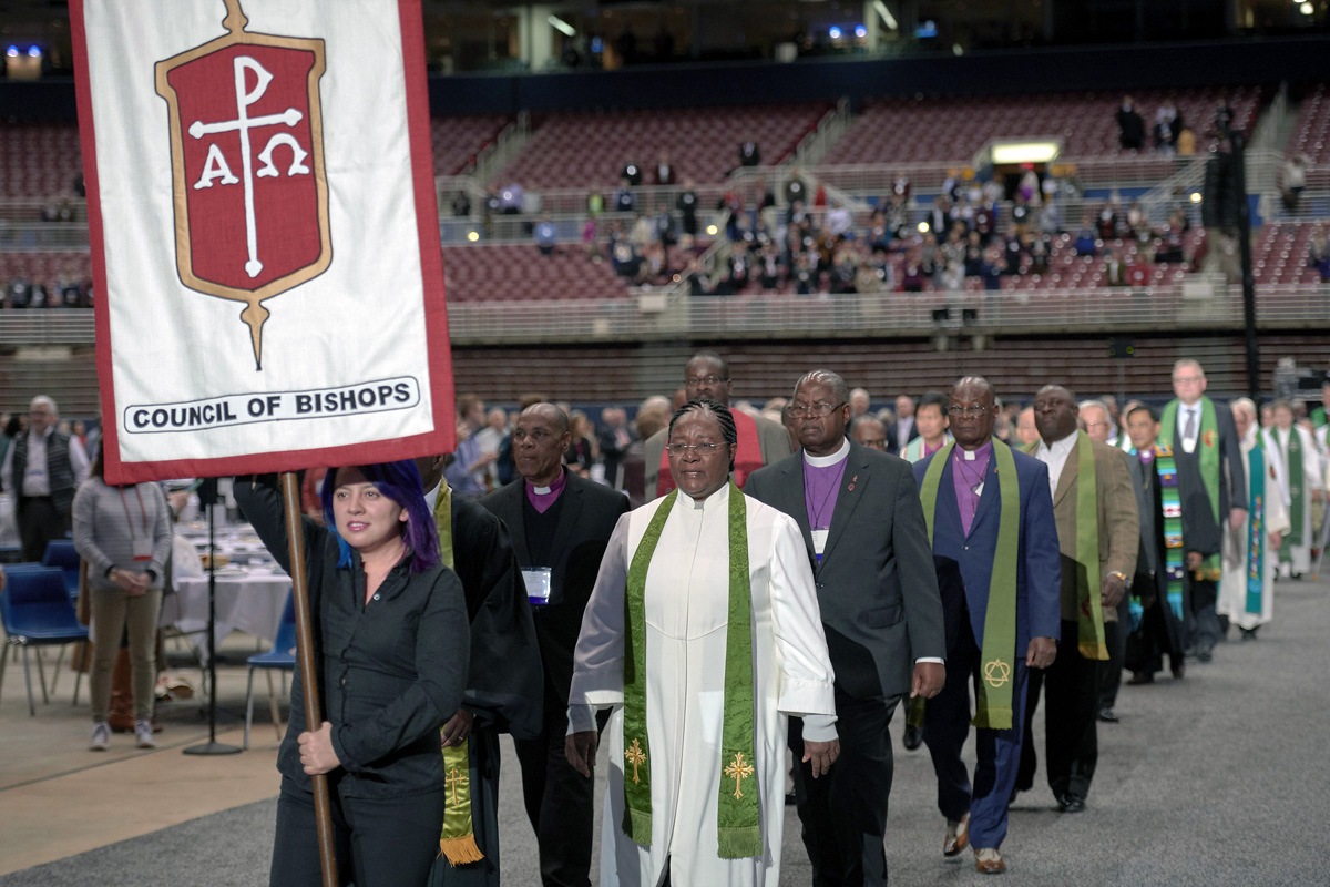Bishops process into worship on Feb. 24, 2019, at the special General Conference of The United Methodist Church, held in St. Louis. Bishops and other church leaders are looking at options to prevent bishops’ funding from going into the red. File photo by Paul Jeffrey for UM News. Bishops process into worship on Feb. 24, 2019, at the special General Conference of The United Methodist Church, held in St. Louis. Bishops and other church leaders are looking at options to prevent bishops’ funding from going into the red. File photo by Paul Jeffrey for UM News.