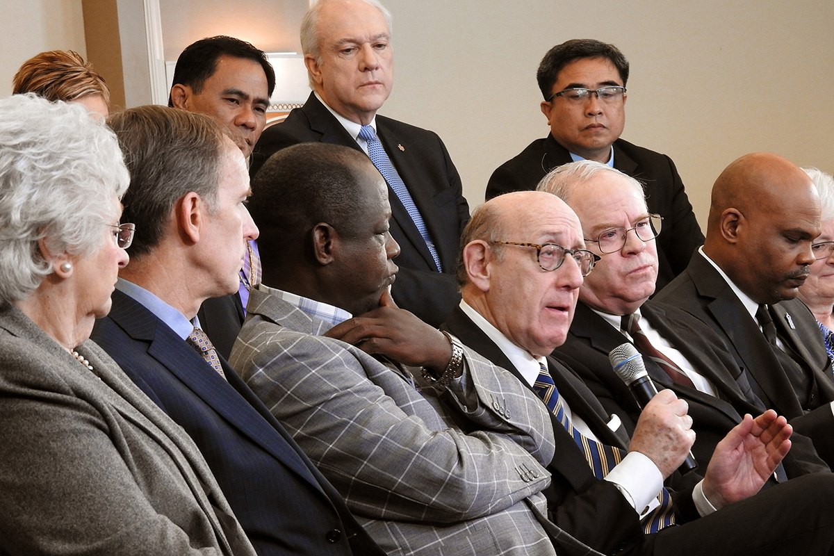Kenneth Feinberg (holding microphone) speaks during a livestreamed panel discussion in Tampa, Fla., with members of the team that developed a new proposal that would maintain The United Methodist Church but allow traditionalist congregations to separate into a new denomination. The United Methodist Judicial Council expects to decide soon whether it has the jurisdiction to consider the constitutionality of legislation for a proposed plan for separating the denomination. File photo by Sam Hodges, UM News. Kenneth Feinberg (holding microphone) speaks during a livestreamed panel discussion in Tampa, Fla., with members of the team that developed a new proposal that would maintain The United Methodist Church but allow traditionalist congregations to separate into a new denomination. The United Methodist Judicial Council expects to decide soon whether it has the jurisdiction to consider the constitutionality of legislation for a proposed plan for separating the denomination. File photo by Sam Hodges, UM News.