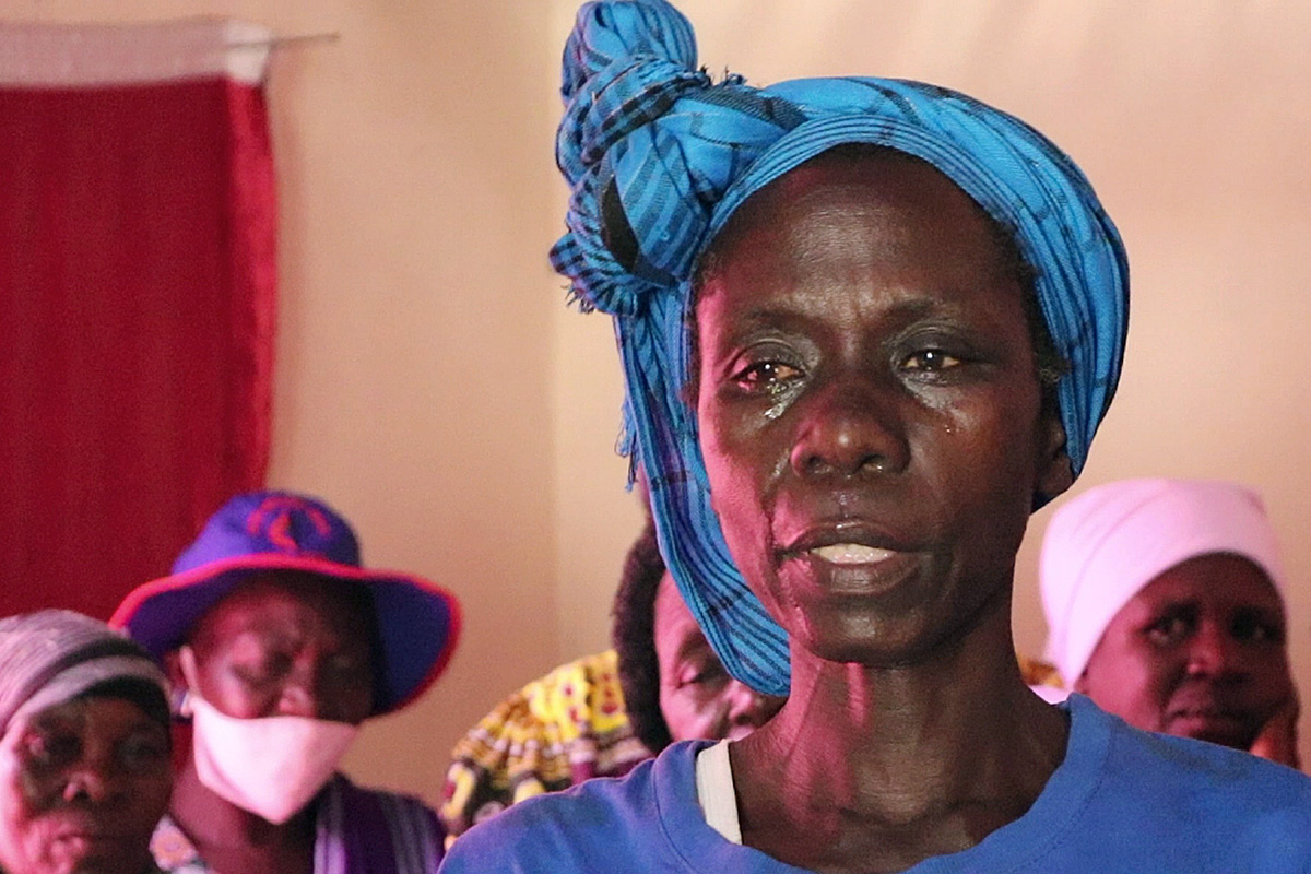 Vivian Chigweshe sheds tears as she expresses appreciation for her new home in Bikita, Zimbabwe, sponsored by the Baltimore-Washington Conference of The United Methodist Church. Nearly two years after Cyclone Idai left catastrophic damage and a humanitarian crisis in Zimbabwe, four families received new homes through the program. Photo by Priscilla Muzerengwa, UM News.