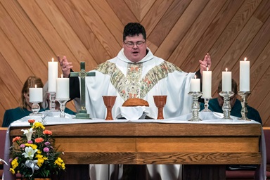 The Rev. Derek Kubilus serves as pastor of Uniontown United Methodist Church in Uniontown, Ohio, though “vicar” is his preferred title. Earlier this year, he debuted “Cross Over Q,” a podcast offering a Christian response to the QAnon conspiracy movement. Photo by Brian Koch. The Rev. Derek Kubilus serves as pastor of Uniontown United Methodist Church in Uniontown, Ohio, though “vicar” is his preferred title. Earlier this year, he debuted “Cross Over Q,” a podcast offering a Christian response to the QAnon conspiracy movement. Photo by Brian Koch.