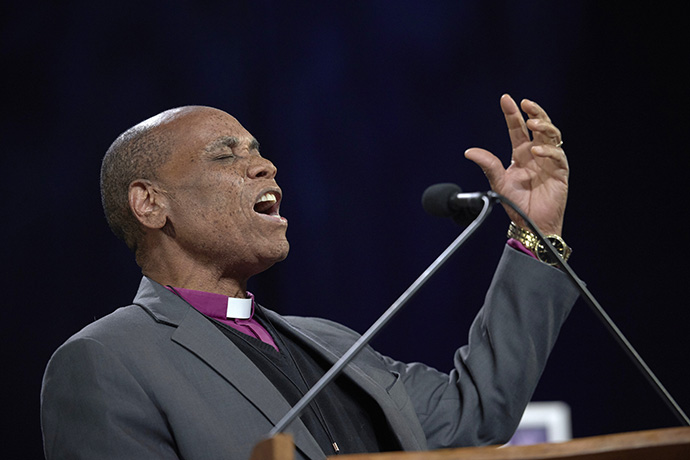 Bishop Eben Nhiwatiwa prays during the 2019 United Methodist General Conference in St. Louis. Nhiwatiwa leads the Zimbabwe Area of The United Methodist Church. File photo by Paul Jeffrey, UM News.