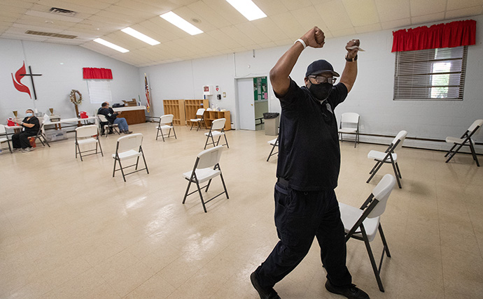 Booker Hopkins celebrates after receiving a COVID-19 vaccination during a clinic at St. Mark’s United Methodist Church in Charlotte, N.C. Photo by Mike DuBose, UM News.