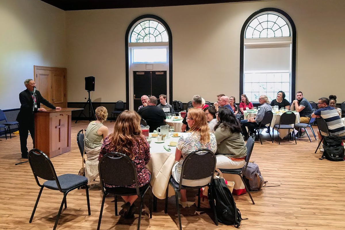 Claremont School of Theology students undergo a first orientation meeting on the campus of Willamette University, in Salem, Ore., in 2019. The United Methodist seminary planned to sell its Claremont, Calif., campus and make a complete move to Willamette. But recent litigation setbacks, affecting the price for a sale, have caused the seminary to decide to operate both in Claremont and Salem. Photo courtesy Claremont School of Theology.