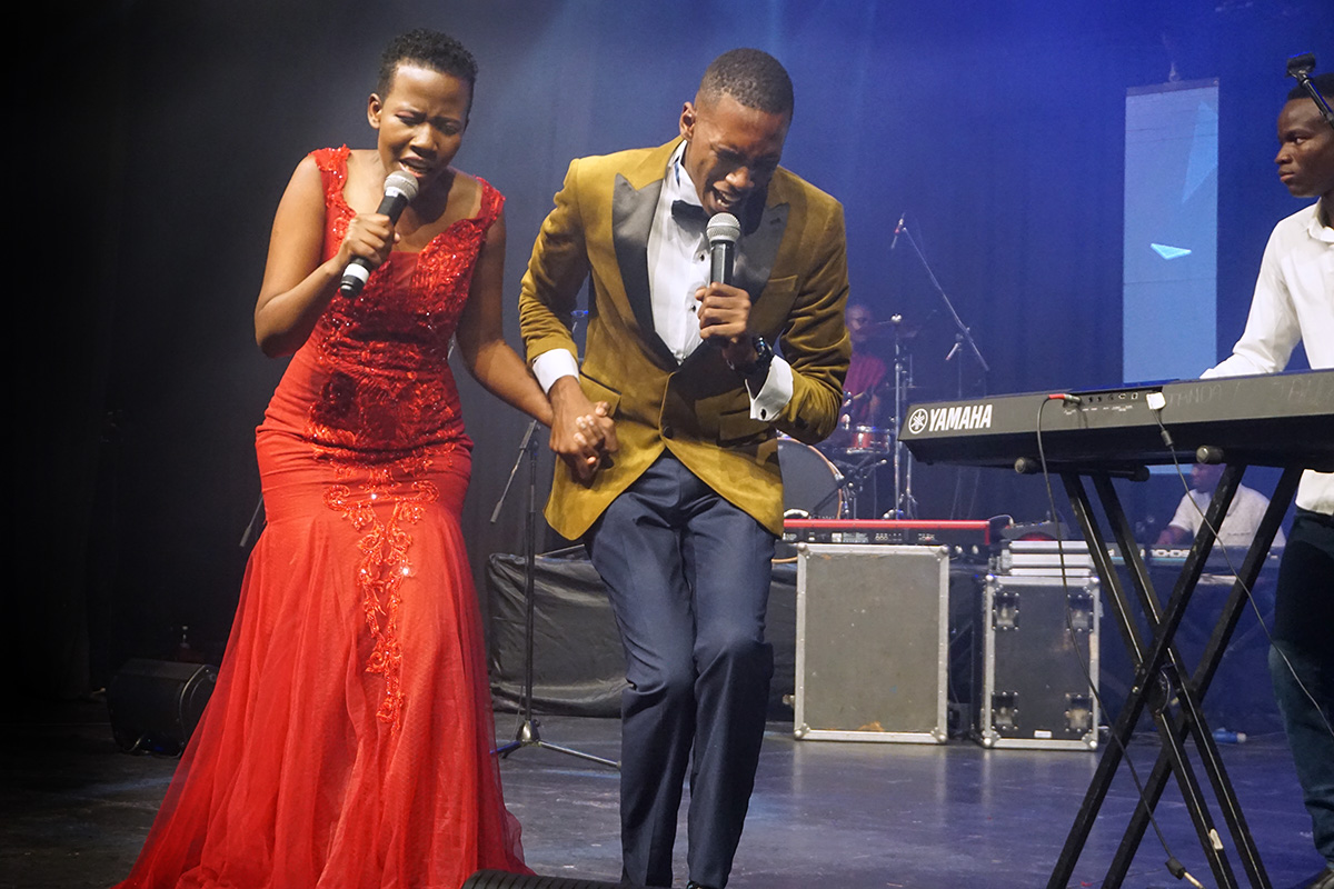 Loice Namatai Chinyerere (left) and Taziwa Brian Mbwizhu sing during the launch of their album at 7 Arts Avondale, a music venue in Harare, Zimbabwe. Photo by Kudzai Chingwe, UM News. Loice Namatai Chinyerere (left) and Taziwa Brian Mbwizhu sing during the launch of their album at 7 Arts Avondale, a music venue in Harare, Zimbabwe. Photo by Kudzai Chingwe, UM News.