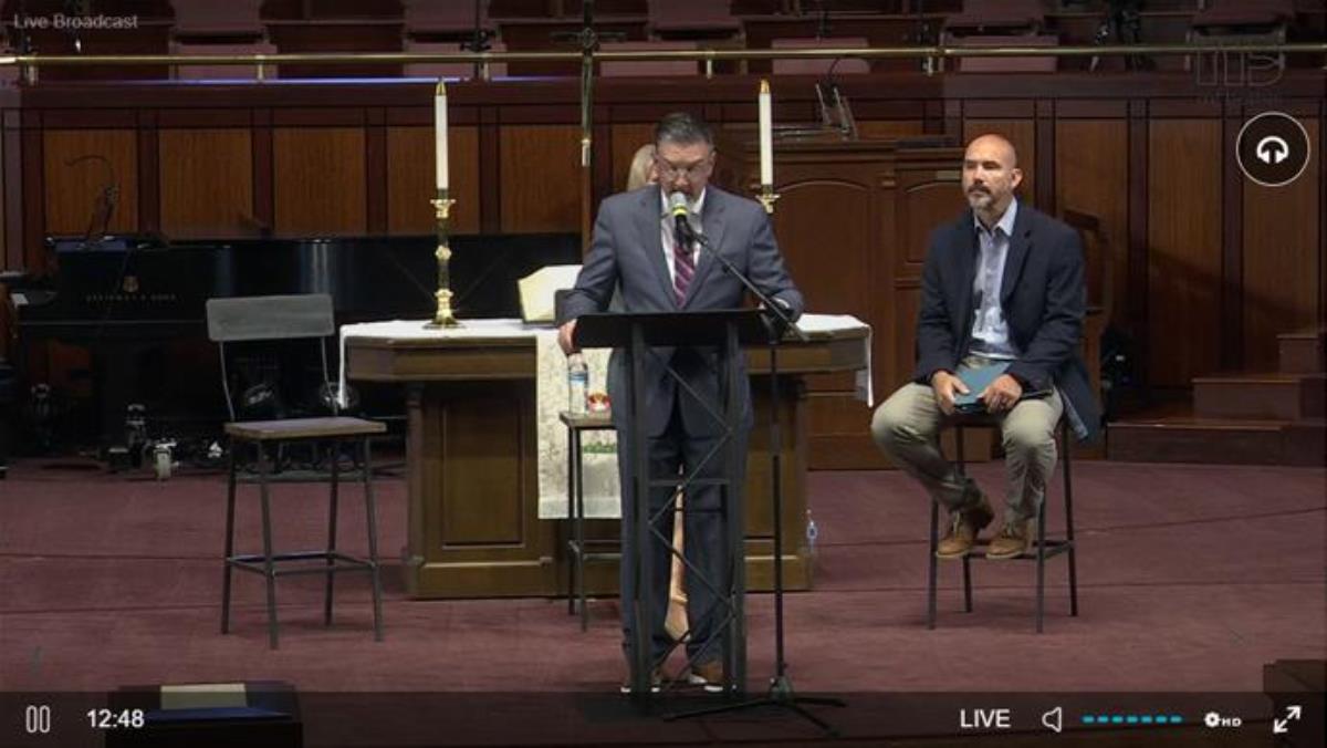 During an April 26 press conference given by Mt. Bethel United Methodist Church, Jody Ray surrenders his clergy credentials in response to being reassigned by Bishop Sue Haupert-Johnson. He remains as the church’s lay preacher and chief administrator. Screenshot of livestream by UM News, courtesy of Mt. Bethel United Methodist Church.